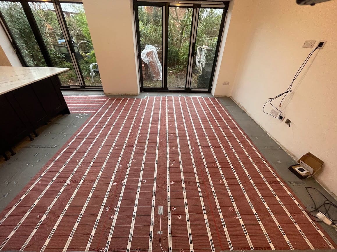 underfloor Heating in an exstention fitted by tilers in Manchester.